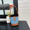 Bolsa tote bucket estilosa e minimalista para mulheres, nova coleção primavera 2026, bolsa de ombro leve e chique, bolsa de braço moderna estilo coreano