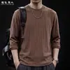 Camiseta de manga larga a rayas texturizadas estilo americano para hombre, nuevo modelo otoño 2026, talla grande, camiseta básica de cuello redondo, ropa blanca