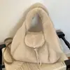 Bolso de mujer elegante de alta gama 2026 nuevo de moda versátil de felpa de mano de un solo hombro moda retro bolso cubo