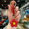 Chaveiro de Girassol Popular Transfronteiriço Cravejado com Diamantes, Pingente Criativo de Bolsa Totalmente Cravejado de Alto Padrão, Pingente de Decoração de Interior de Carro