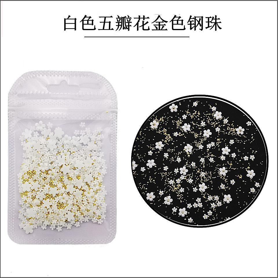 白色五瓣花金色钢珠