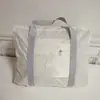 Bolso de Maternidad Portátil de un Solo Hombro Bolsa de Almacenamiento para Viaje Plegable de Tela Bolsa para Avión Bolso de Viaje Multifuncional de Gran Capacidad Venta al por Mayor