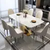 Mesa de comedor rectangular de placa de roca y combinación de sillas mesa de comedor para hogar apartamento pequeño mesa de celebridad de internet de estilo italiano simple moderno de lujo ligero
