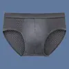 Calzoncillos de malla de seda helada de secado rápido para hombre, ropa interior transpirable de verano fresca con perforaciones