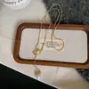 Colar Pingente Longo Pérola Dourada Feminino Outono e Inverno Retro Acessível Luxo Corrente de Suéter de Ponta Puxar Ajustável Acessórios