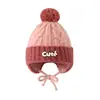 Gorro de invierno para niños, gorro de punto con etiqueta SMILE, protección para las orejas, pompón, gorro de punto cálido, gorro tipo pullover a prueba de viento para niños de mediana edad