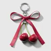 Primavera Nuevo Ins Estilo Coreano Dulce Moda Clásico Color Sólido Lazo Cereza de Simulación Llavero Colgante de Bolso