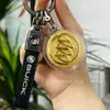 Colgante con Logo de Coche Dorado Personalización de LOGO Oro Puro 999 Llavero de Cuero Regalo para Dueño de Coche Tráfico Conducción Colgante Venta al por Mayor