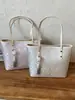 Mochila Tote de Mano Estilo Étnico Nuevo Verano 2026, Aspecto de Alta Calidad, Estilo Nacional, Bolso de Hombro Grande de Capacidad Personalizado para Mujer