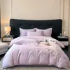 Juego de cama de lujo y elegante de cuatro piezas 100% algodón de fibra larga de Xinjiang, hecho completamente de algodón puro, con diseños florales y bordados de alta gama, adecuado para madres y bebés