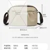 Bolsa Transversal Simples de Nicho Feminina Versátil Leve Nova Moda Primavera e Verão 2025 Bolsa de Ombro Bolsa de Tecido de Nylon Impermeável