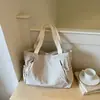 Bolsa Tote Casual de Lona Transfronteiriça para Aula, Trabalho e Uso Diário Feminina de Grande Capacidade Nova Moda 2026 Bolsa de Ombro Simples