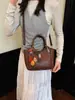 Elegante y estiloso bolso de mano tipo cesta Henggeng, nuevo modelo de moda versátil para uso casual, bolso de hombro y cruzado
