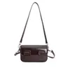 Bolsa Baguete Simples Portátil da Moda Estilo Coreano para Mulheres Inverno 2025 Novo Estilo Personalizado Tendência Versátil Bolsa de Ombro Único Transversal