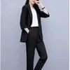 Conjunto de botão de cor sólida para primavera e outono, roupas femininas plus size, estiloso e rejuvenescedor, cobre a barriga, conjunto de duas peças, moderno para mulheres plus size, atacado para vendas transfronteiriças