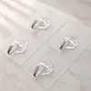 Venta al por mayor pasta transparente sin perforaciones Gancho Lijia fuerte uso gancho invisible sin costuras pared puerta gancho pequeño gancho adhesivo