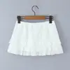 Conjunto Branco Top com Renda Bordada Vazada Estilo Francês, Manga Bufante + Saia de Camadas com Cordão