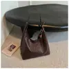 Bolsa de ombro minimalista retrô transfronteiriça com uma vibe de alta qualidade e casual, bolsa tote fashion com design de padrão trançado, bolsa mãe-filha para mulheres
