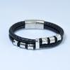 Europa y Estados Unidos pulsera de joyería de venta caliente de acero de titanio tejido de cuero pulsera de cuero de personalidad para hombre de acero inoxidable fabricantes mayoristas T127