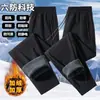 Pantalones impermeables y cálidos transfronterizos, pantalones cortavientos de corte recto holgados, pantalones de invierno engrosados con forro polar, pantalones casuales unisex para exteriores