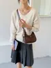 Bolso de hombro nuevo con patrón tejido para mujer, bolso cruzado retro coreano, bolso de axila con diseño de nicho, bolso moderno y versátil