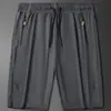 Shorts Masculinos de Seda de Gelo Verão 2024 Esportivos de Comprimento Médio Soltos Secagem Rápida Cinco Pontos Praia Casual Esportivo