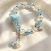 Nuevo brazalete de vidrio con cuentas florales para mujer con pompones y borlas, accesorio cultural y creativo para estudiantes, artículo popular en zonas escénicas, al por mayor