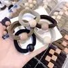 Coreia do Sul Dongdaemun elástico cor de chá com leite textura bola anel de toalha elástico faixa de cabelo moda simples temperamento corda de cabelo