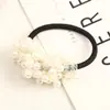 AliExpress Amazon popular corda de cabelo de pérola com contas feita à mão moda feminina elástico anel de cabelo adorno de cabeça flor atacado
