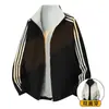 Chaqueta reversible, marca de moda deportiva americana, chaqueta de tres rayas, estilo unisex para pareja, sudadera versátil de corte holgado para primavera y otoño