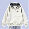 Conjunto de jaqueta com zíper e capuz estilo americano para meninas, primavera e outono de 2026, combinado com jeans da moda com gravata borboleta