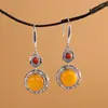 El personaje plata S925 plata de ley cera de abeja pendientes literario retro hueco damas antiguo temperamento hermosos pendientes estilo chino