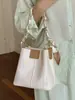 Bolso tipo cubo de alta apariencia 2026 Verano Nuevo de Moda Bolso Cruzado de Cadena Nicho Estilo Relajado Bolso de Mano de Color Sólido