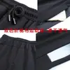 Calça Nova de Outono 2026 com Blocos de Cor Laterais, Tecido em Camadas Bicolor, Calça Esportiva para Exterior, Calça de Treino de Secagem Rápida para Homens