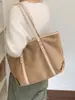 Bolsa de camurça simples e retrô para mulheres, nova coleção 2026, bolsa de ombro de grande capacidade para o dia a dia, com um design de tote descontraído e estiloso