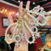 Chaveiro de corrente de pérolas artesanal criativo transfronteiriço com argila incrustada de diamantes para meninos e meninas, pingente de bolsa para casais atacado