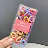 Nova caixa de doces coloridos corda de cabelo anéis de cabelo para crianças anéis de toalha para meninas tendões de borracha corda de amarrar anel de polegar para bebê capa de couro