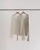 Top de punto Fan Shun SC, estilo coreano, color sólido, escote en V minimalista, adelgazante, colección de otoño Dongdaemun, camisa versátil de manga larga