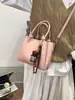 Bolso Cubo Retro Simple Versátil 2026 Modelo Nuevo Bolso de Hombro Cruzado de Alta Gama para Mujer Bolso de Viaje de Moda Tendencia