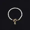 2025 Moda Nueva Transfronteriza Pulsera de Letras Inglesas Cobre Incrustado Circonita Oval Perla de Imitación Pulsera de Perlas al por Mayor