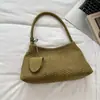 Bolsa de ombro/axila lisa com padrão trançado para o dia a dia, novo modelo outono 2026, alto valor estético, sensação relaxada, bolsa de mão de nicho, moderna