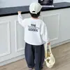 Camiseta de Manga Larga para Niños Primavera 2026 Nuevo Estilo Camiseta Blanca Infantil Top de Primavera y Otoño para Niños Ropa Interior para Estudiantes de Primaria Fresca
