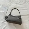 Bolso de axila de nicho estilo coreano para mujer, moda de tendencia nuevo para principios de otoño de 2026, bolso de mano y bolso de hombro elegantes de lujo ligero