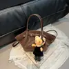 Bolsas Otoño e Invierno Súper Populares de Nicho Bolsos de Gamuza para Mujer 2025 Nuevo Versátil Bolso Cruzado Bolso de Mano de Moda