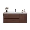 Tocador de baño de color nogal con lavabo, una combinación de estilo chino y un lavabo cerámico integrado para lavarse las manos y la cara