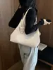 Bolso de hombro tejido para commuter transfronterizo, bolso de mano de diseño simple de nicho, bolso cruzado casual versátil para el uso diario