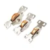 Riel para puerta corredera de armario con ruedas de cobre, accesorios de ruedas superior e inferior de acero inoxidable para puerta corredera, suministro directo del fabricante