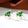Pendientes de Moda Transfronterizos Color Dorado Gota de Agua Esmeralda Circonita Hoja de Arce, Estilo Lujo Ligero, Pendientes Versátiles Completos de Diamante para Otoño e Invierno