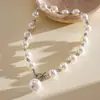 Colar europeu e americano vintage com pérolas e fecho OT cravejado de diamantes, corrente de clavícula de nicho de alta qualidade, acessório feminino simples e versátil