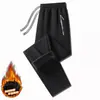 Calça de moletom grossa e quente com forro de fleece para homens, estilo solto de perna reta, nova calça casual outono/inverno para homens